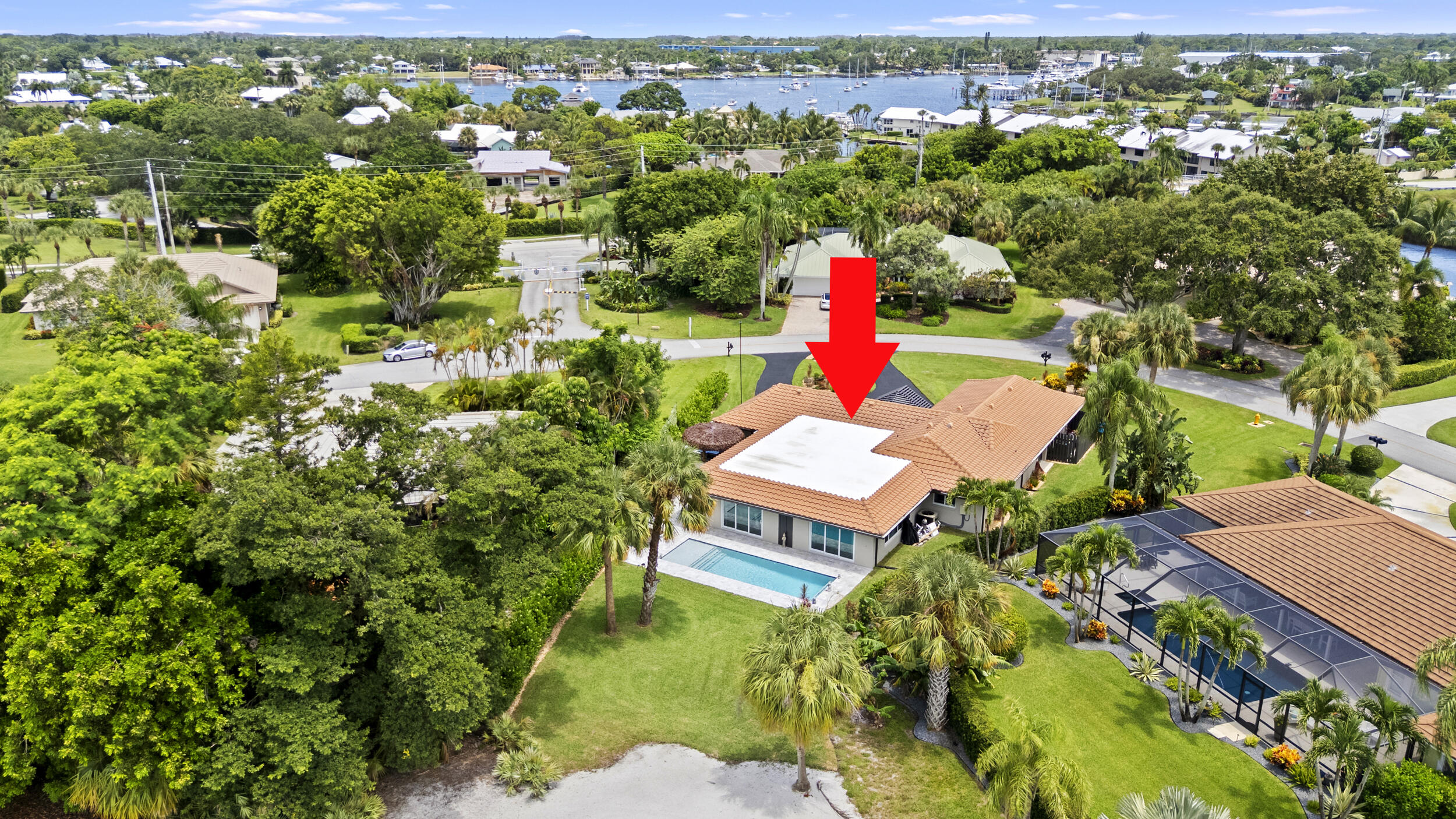 3763 Southeast Fairway East Stuart, FL 34997 - Photo 44 of 54 DJI_20250530204626_0185_D