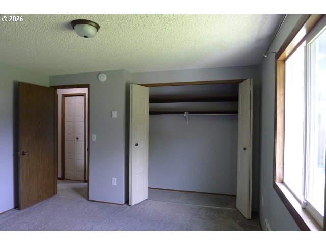 412 Camellia Court Reedsport, OR 97467 - Photo 29 of 48 a view of an empty room and window