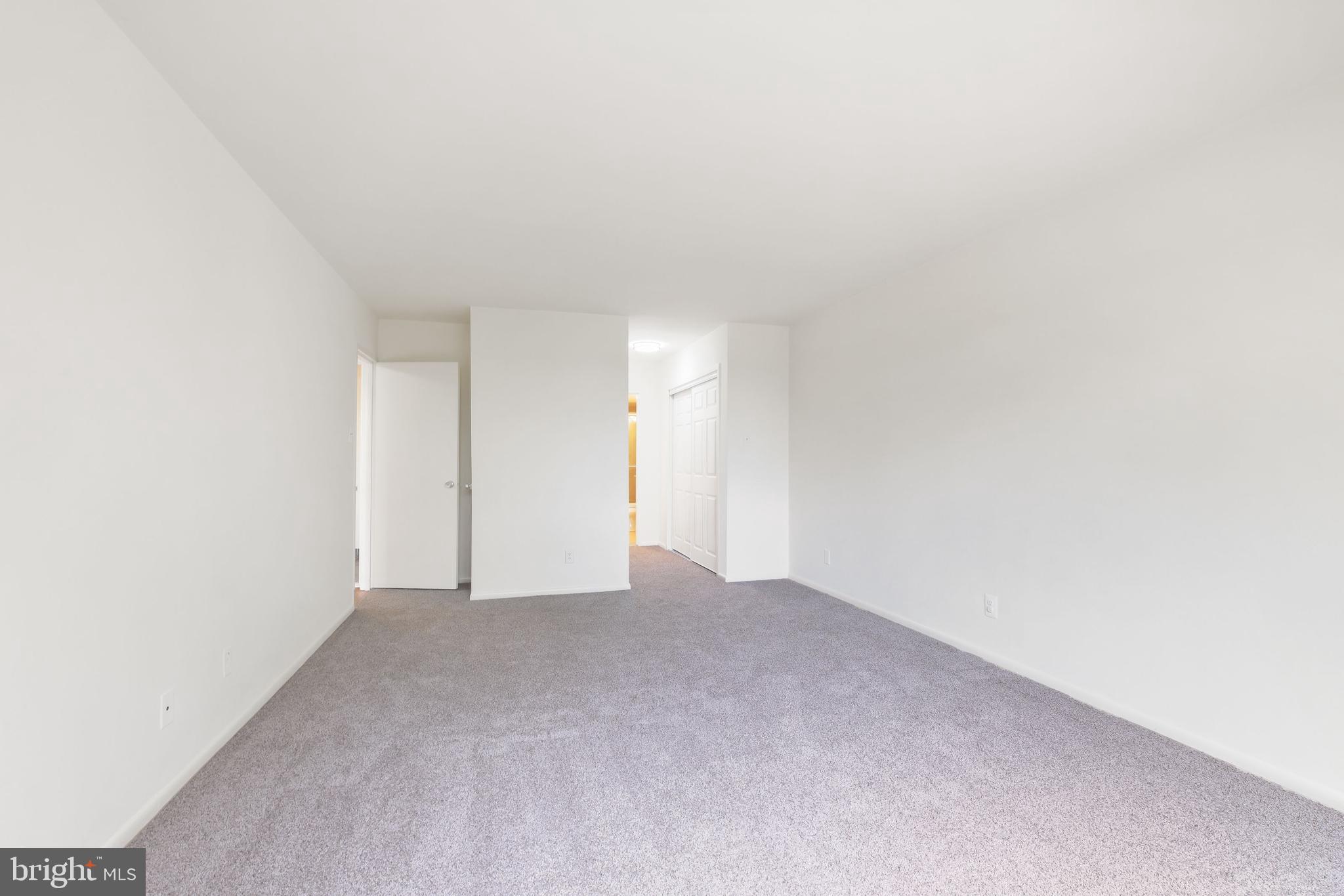 5101 River Road, Unit 513 Bethesda, MD 20816 - Photo 20 of 42 Spacious Primary Bedroom