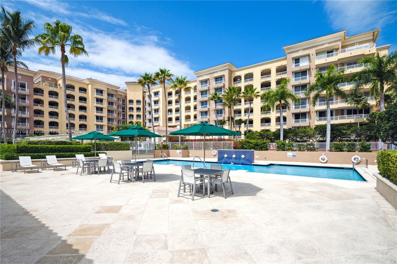 765 Crandon Boulevard, Unit 111 Key Biscayne, FL 33149 - Photo 24 of 57 a view of swimming pool with outdoor seating
