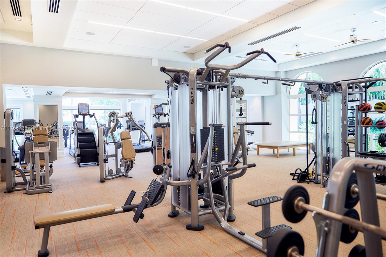 765 Crandon Boulevard, Unit 111 Key Biscayne, FL 33149 - Photo 26 of 57 a view of a room with gym equipment