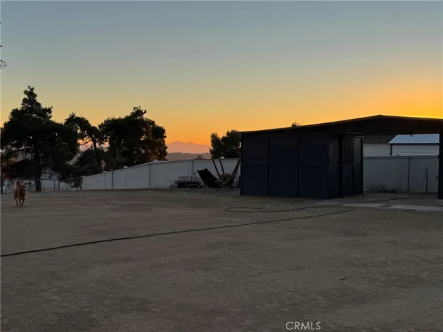 a view of a house with a street