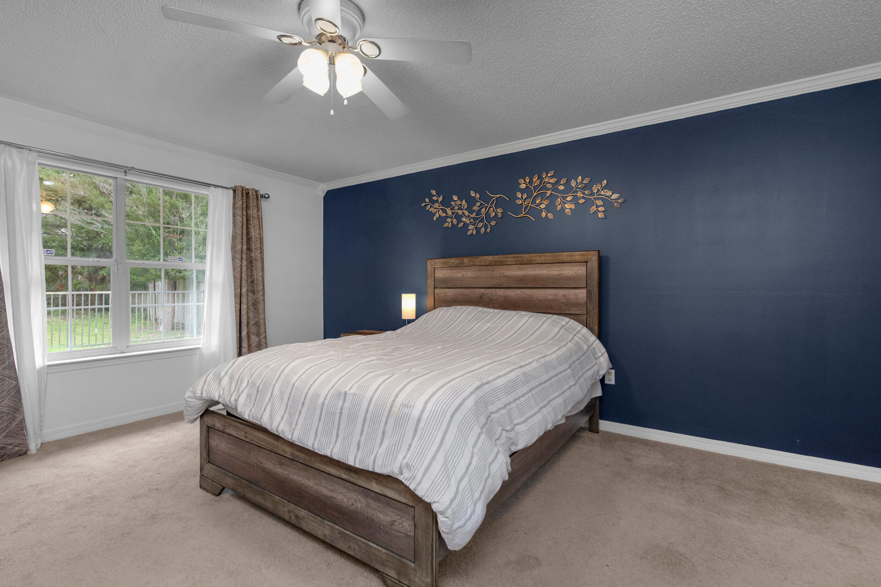 4439 Antioch Road Crestview, FL 32536 - Photo 20 of 32 a bedroom with a bed and window