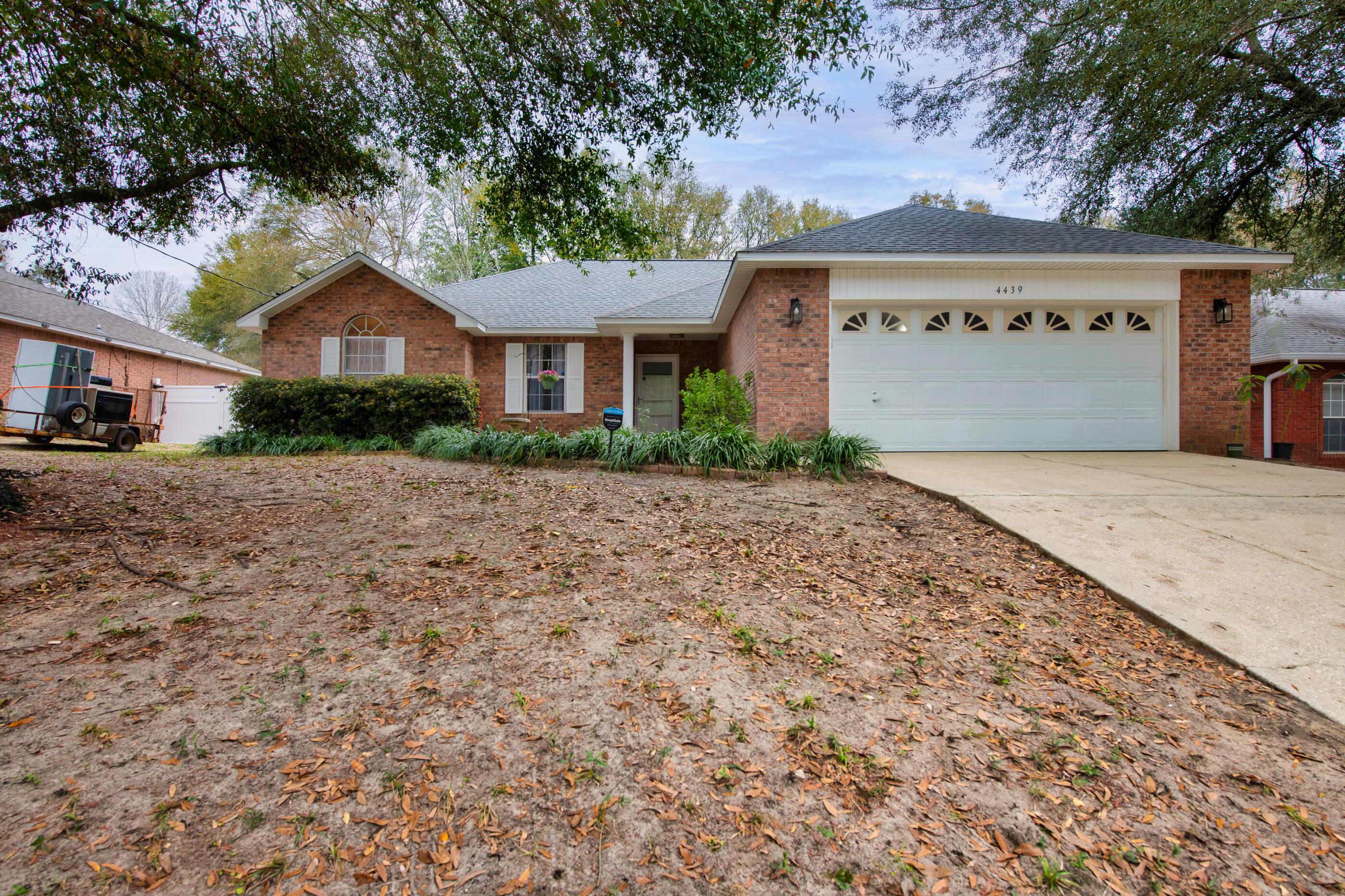 4439 Antioch Road Crestview, FL 32536 - Photo 2 of 32 a front view of a house with a yard