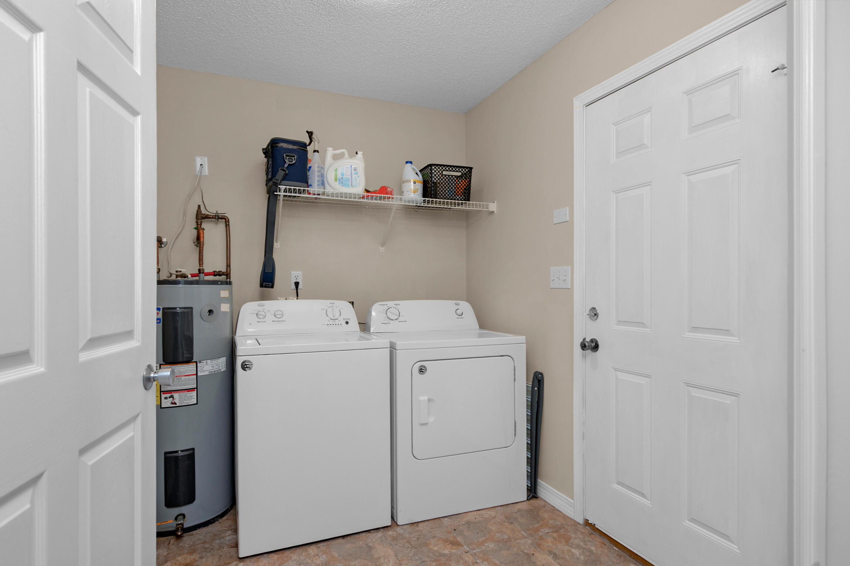 4439 Antioch Road Crestview, FL 32536 - Photo 22 of 32 a utility room with dryer and washer