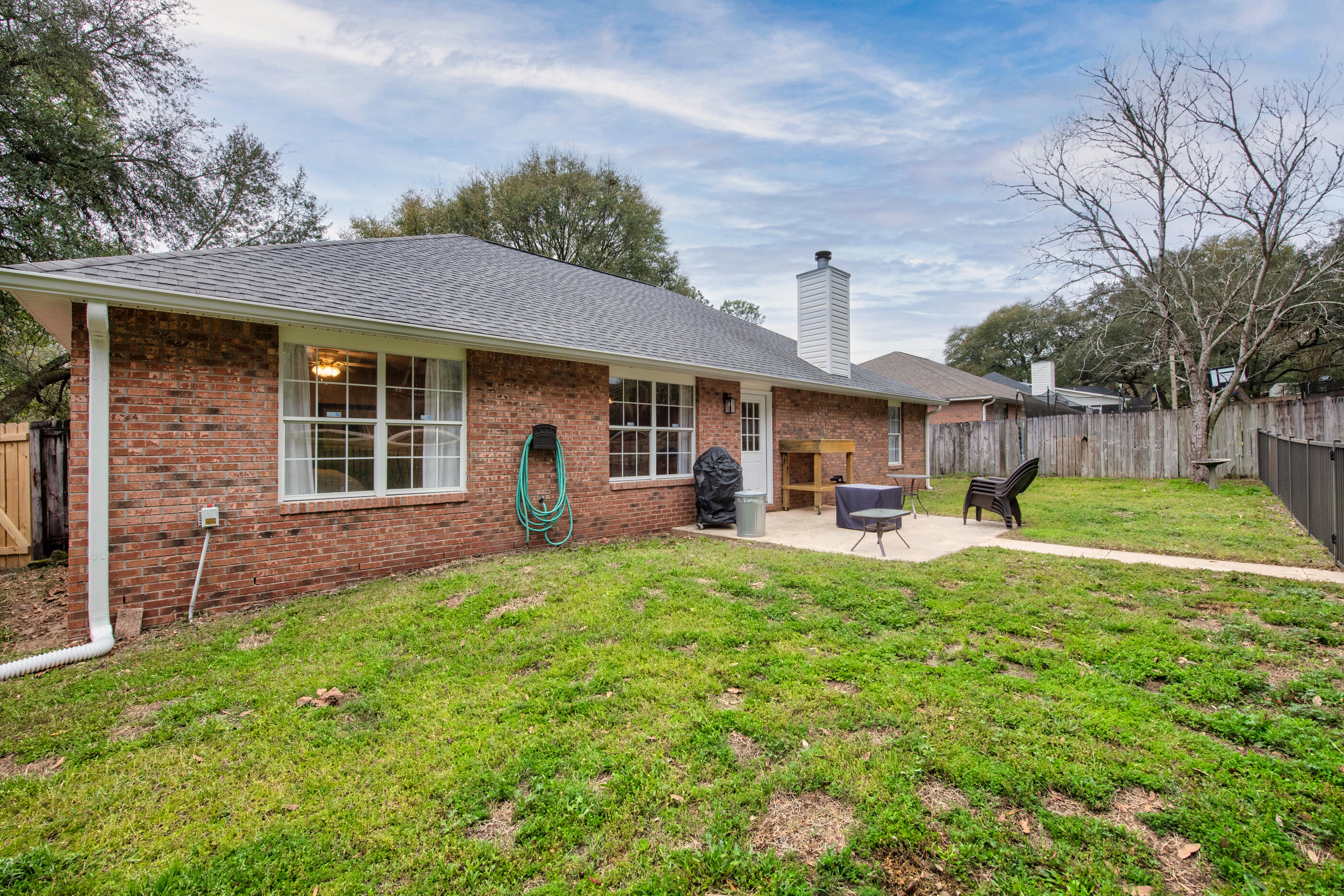 4439 Antioch Road Crestview, FL 32536 - Photo 25 of 32 a house view with a sitting space and garden