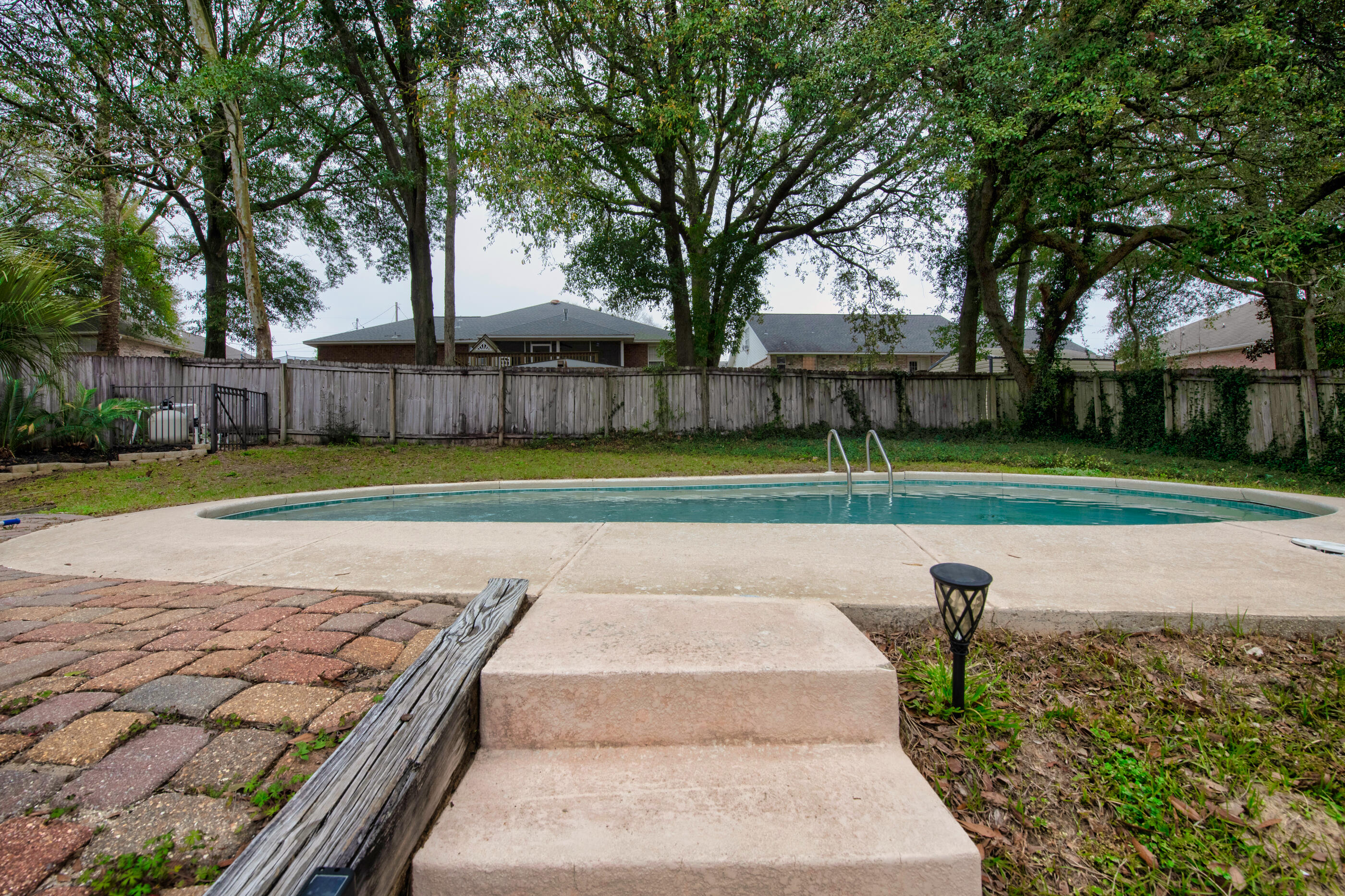 4439 Antioch Road Crestview, FL 32536 - Photo 26 of 32 a view of a backyard with green space