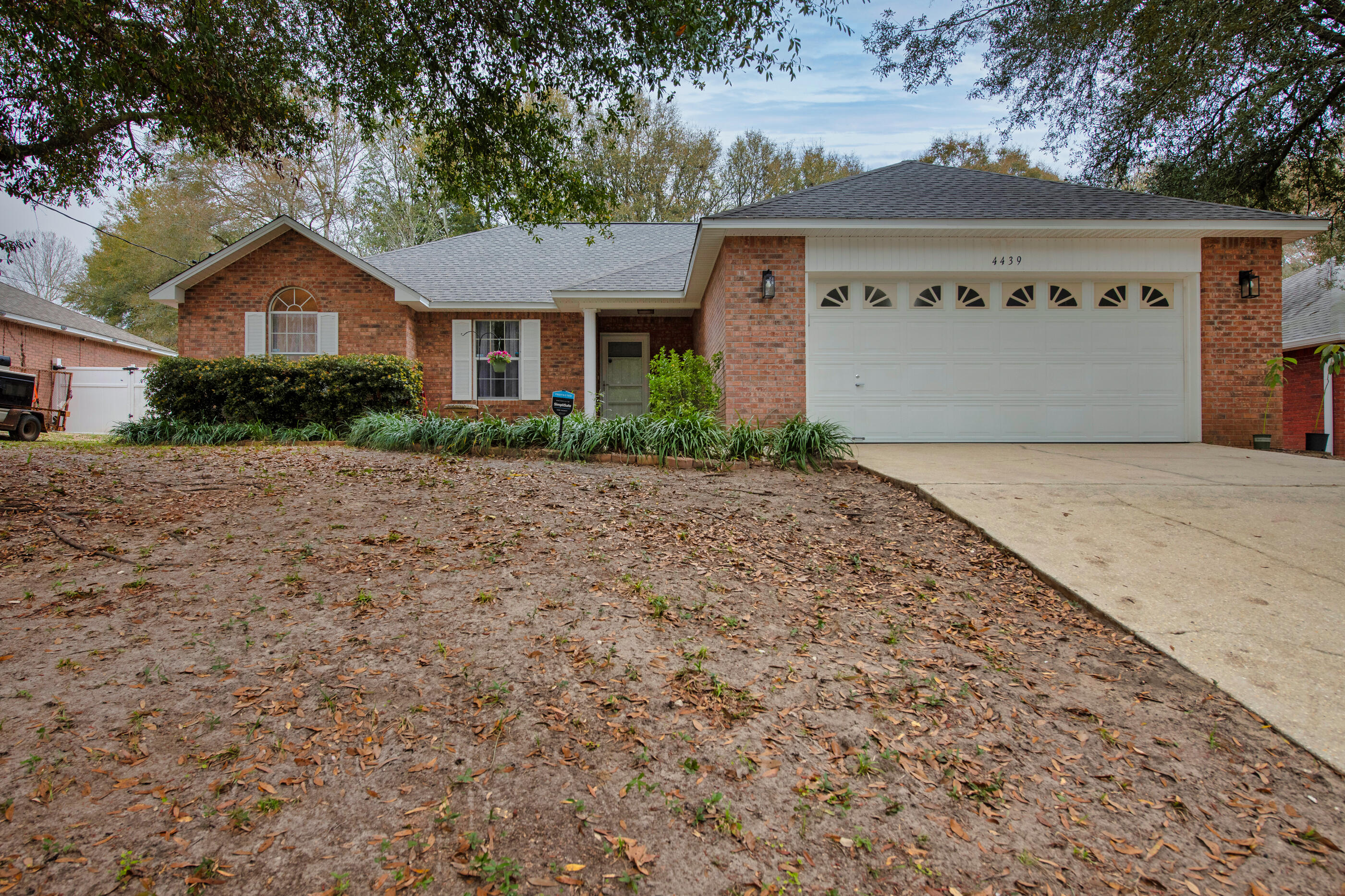 4439 Antioch Road Crestview, FL 32536 - Photo 31 of 32 a front view of a house with a yard