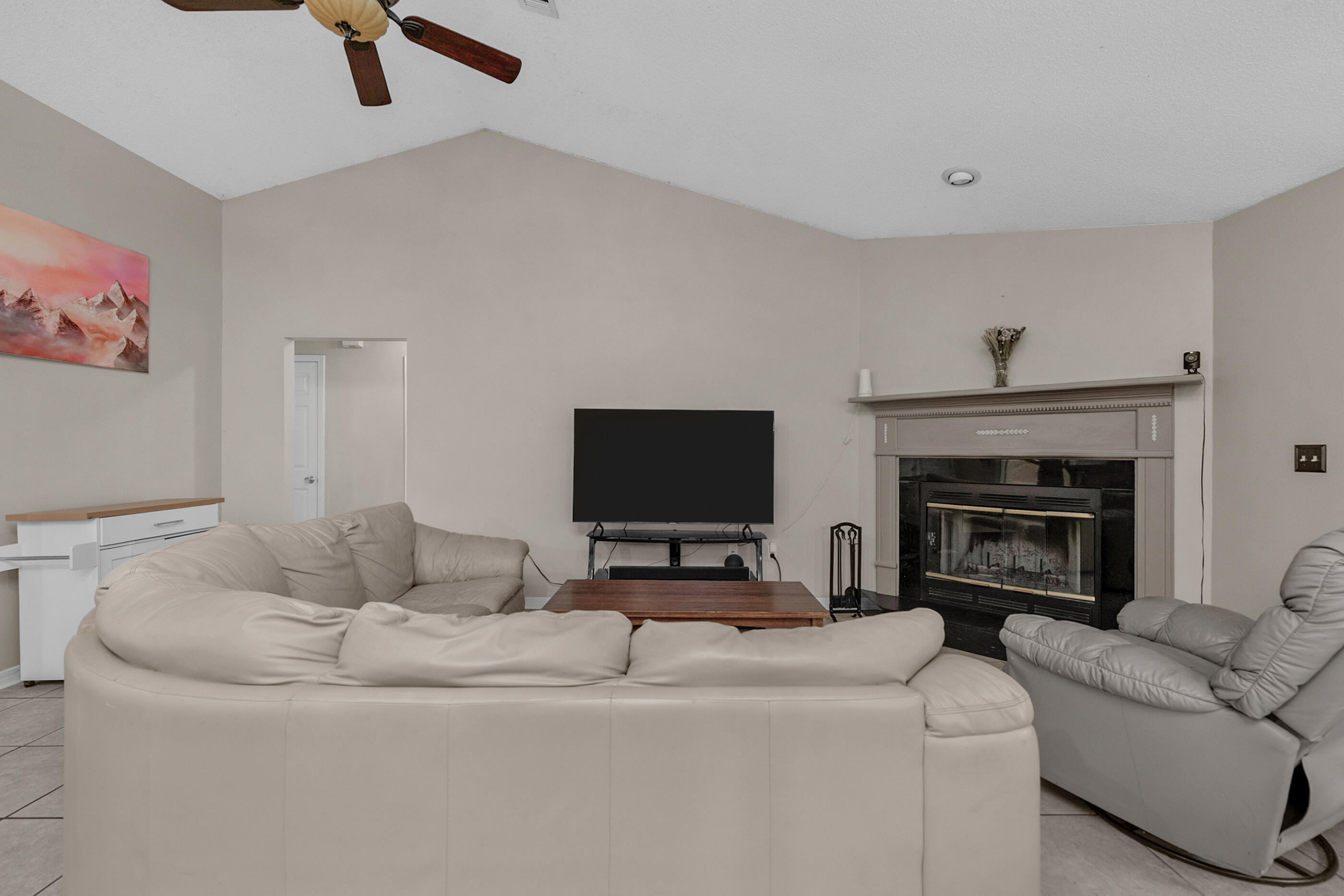4439 Antioch Road Crestview, FL 32536 - Photo 10 of 32 a living room with furniture and a fireplace