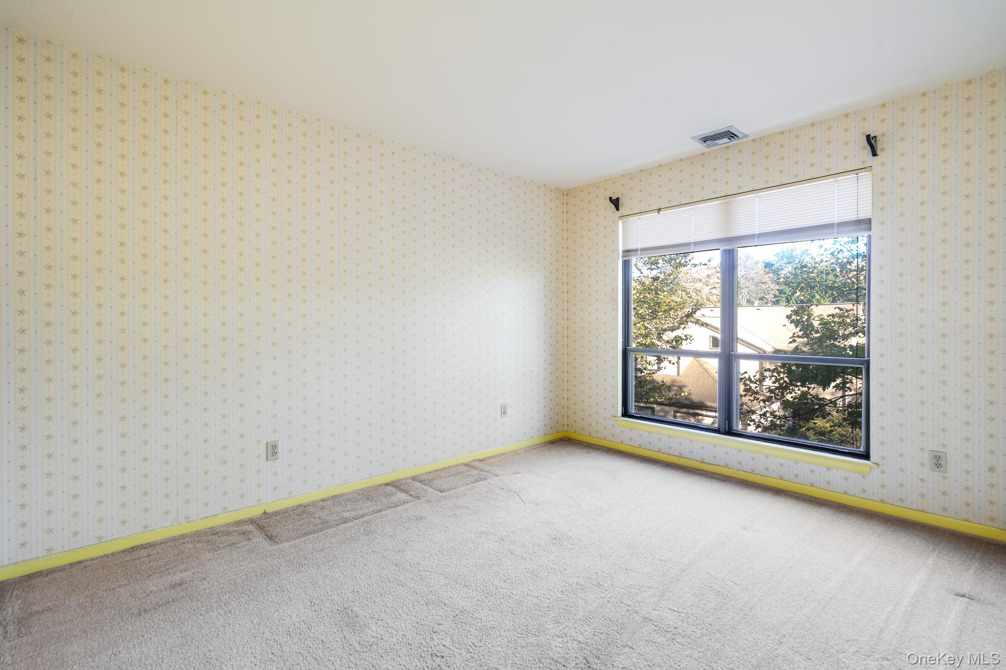 113 Antler Ridge, Unit 113 Ossining, NY 10562 - Photo 13 of 26 an empty room with windows