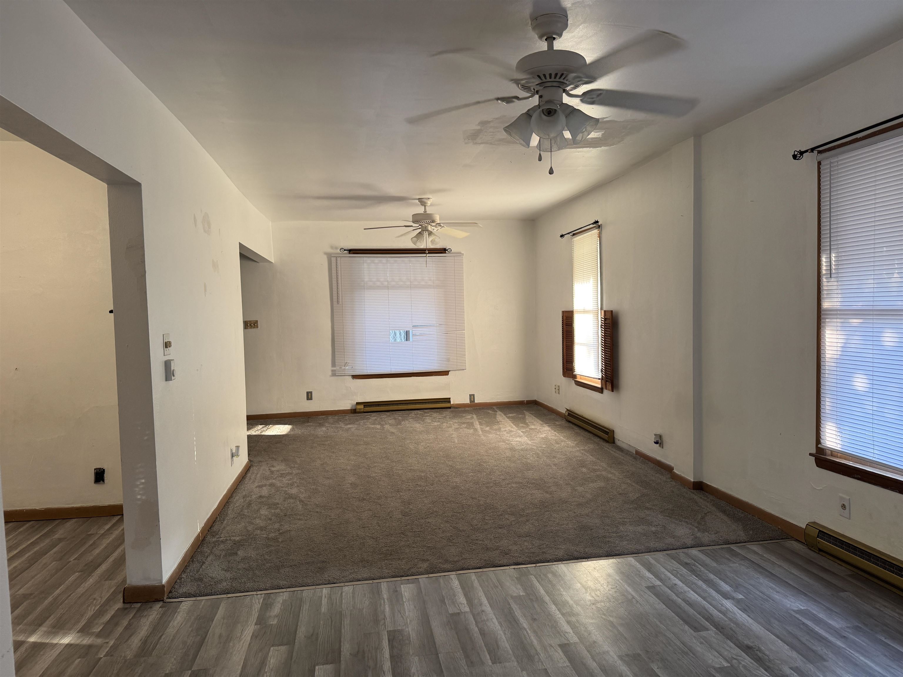 316 West American Street Freeport, IL 61032 - Photo 12 of 18 wooden floor in an empty room with a window