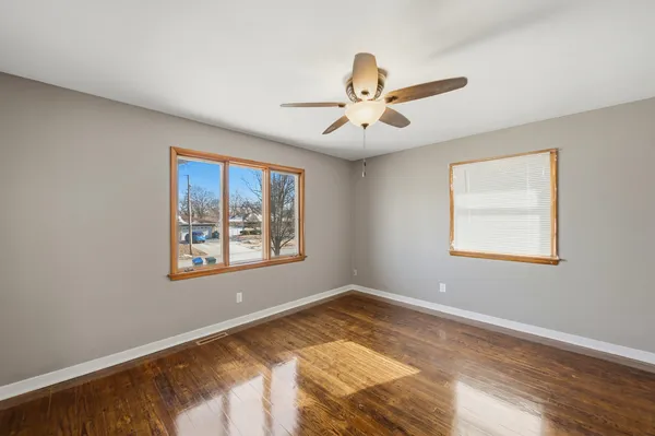 a view of an empty room with a window