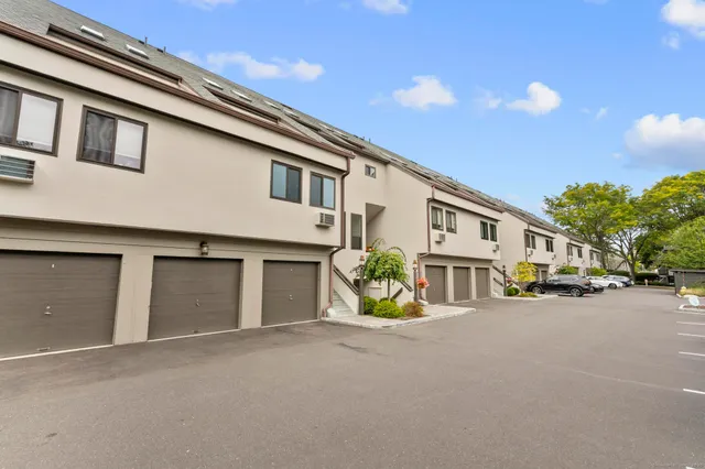 a view of a street with a building