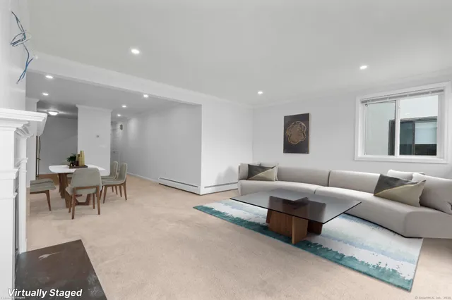 a living room with furniture and a couch