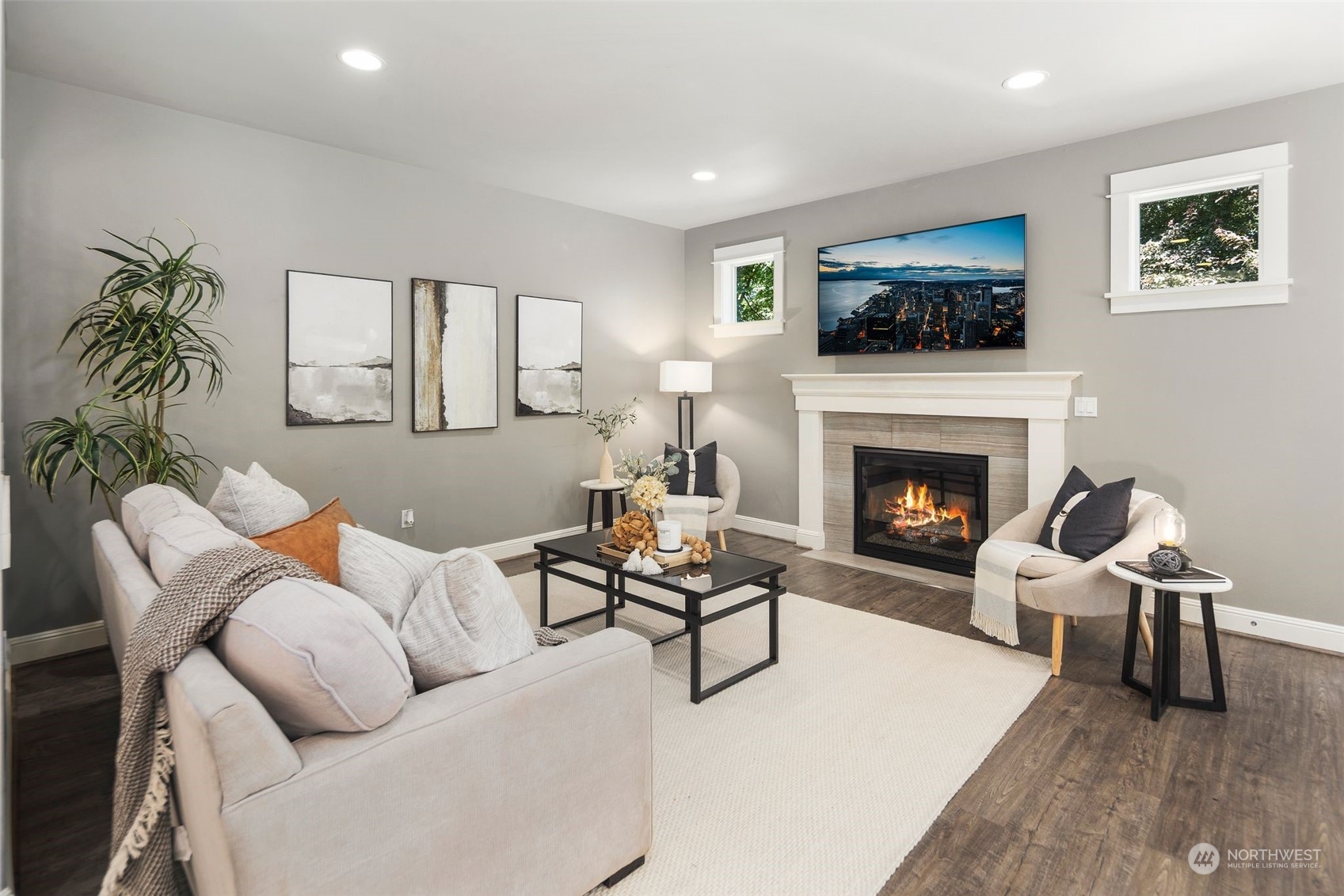 22817 Barker Road Bothell, WA 98021 - Photo 17 of 40 a living room with furniture and a fireplace