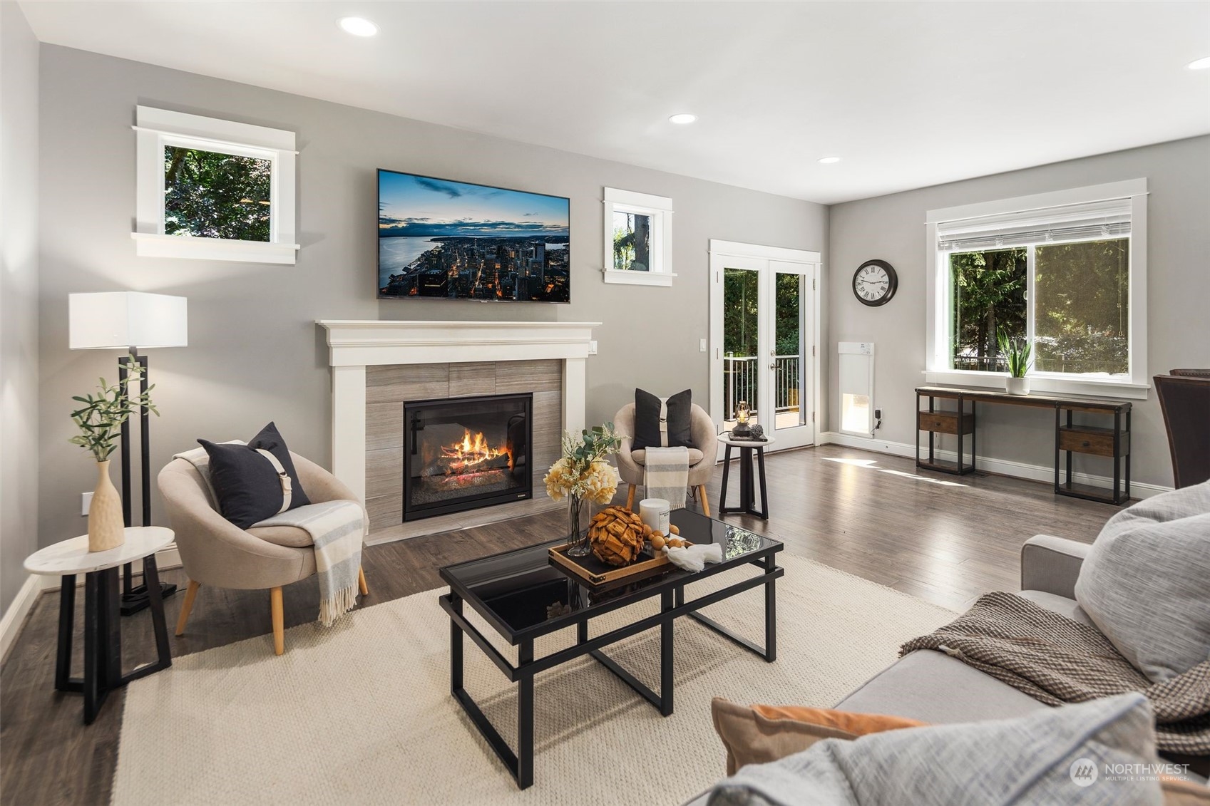 22817 Barker Road Bothell, WA 98021 - Photo 18 of 40 a living room with furniture fireplace and window