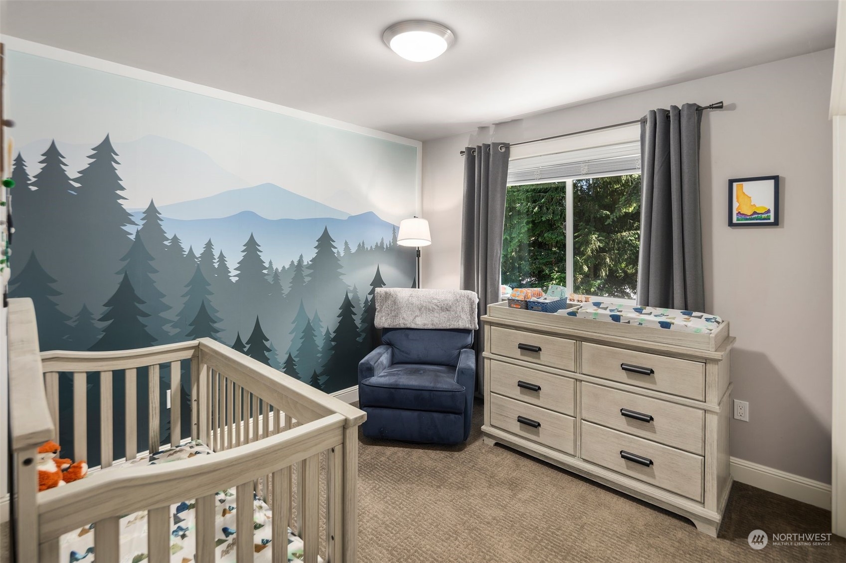22817 Barker Road Bothell, WA 98021 - Photo 23 of 40 a view of a bedroom with furniture and window