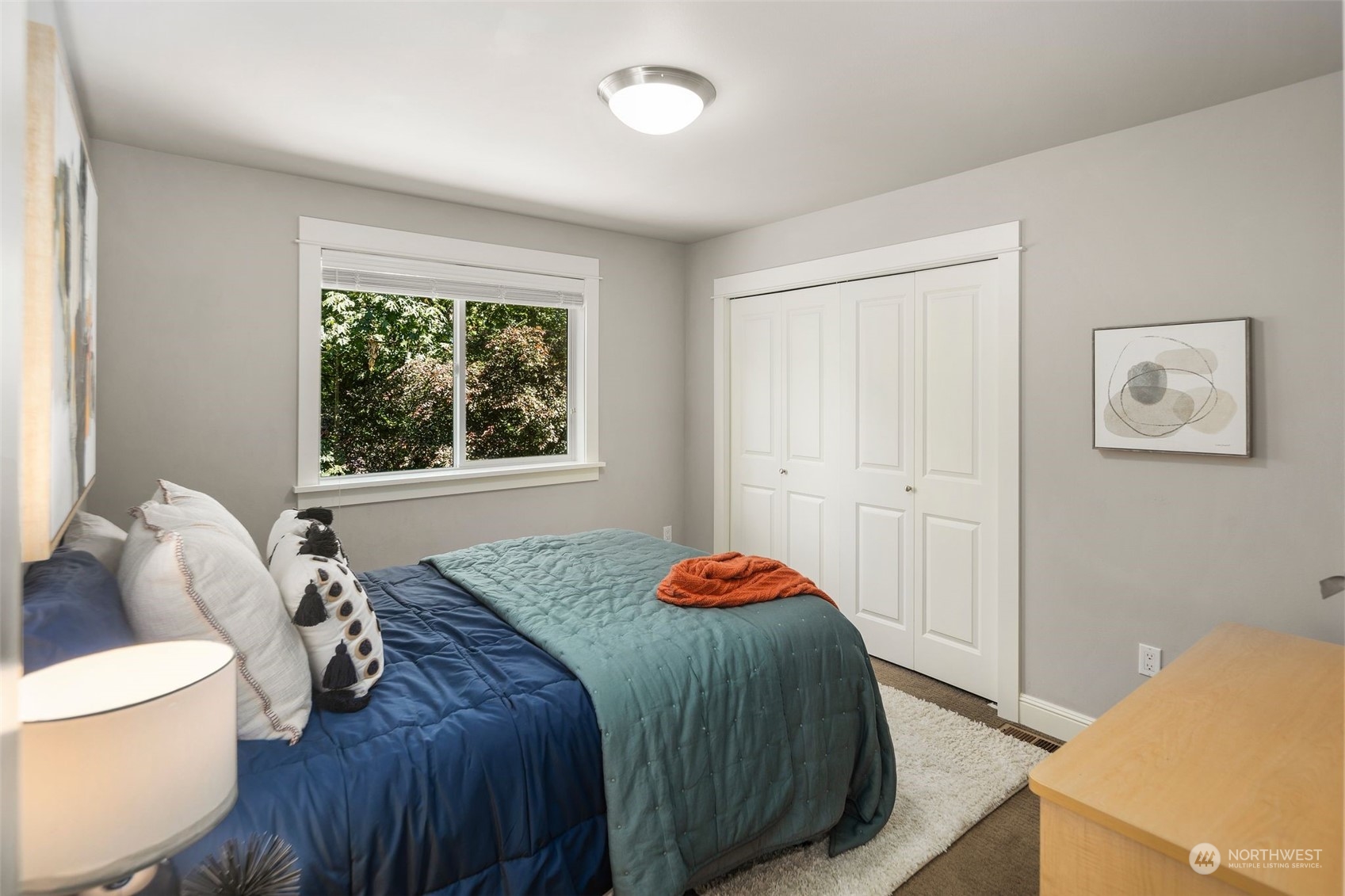 22817 Barker Road Bothell, WA 98021 - Photo 24 of 40 a bedroom with a bed and a window