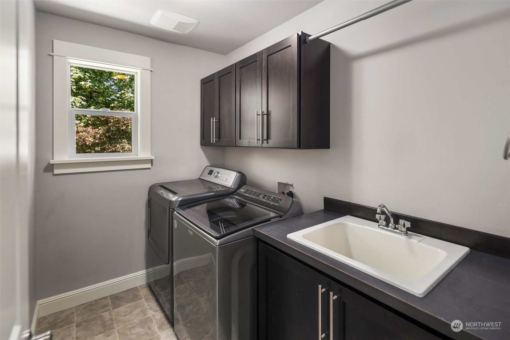 22817 Barker Road Bothell, WA 98021 - Photo 25 of 40 a kitchen that has a sink and a stove