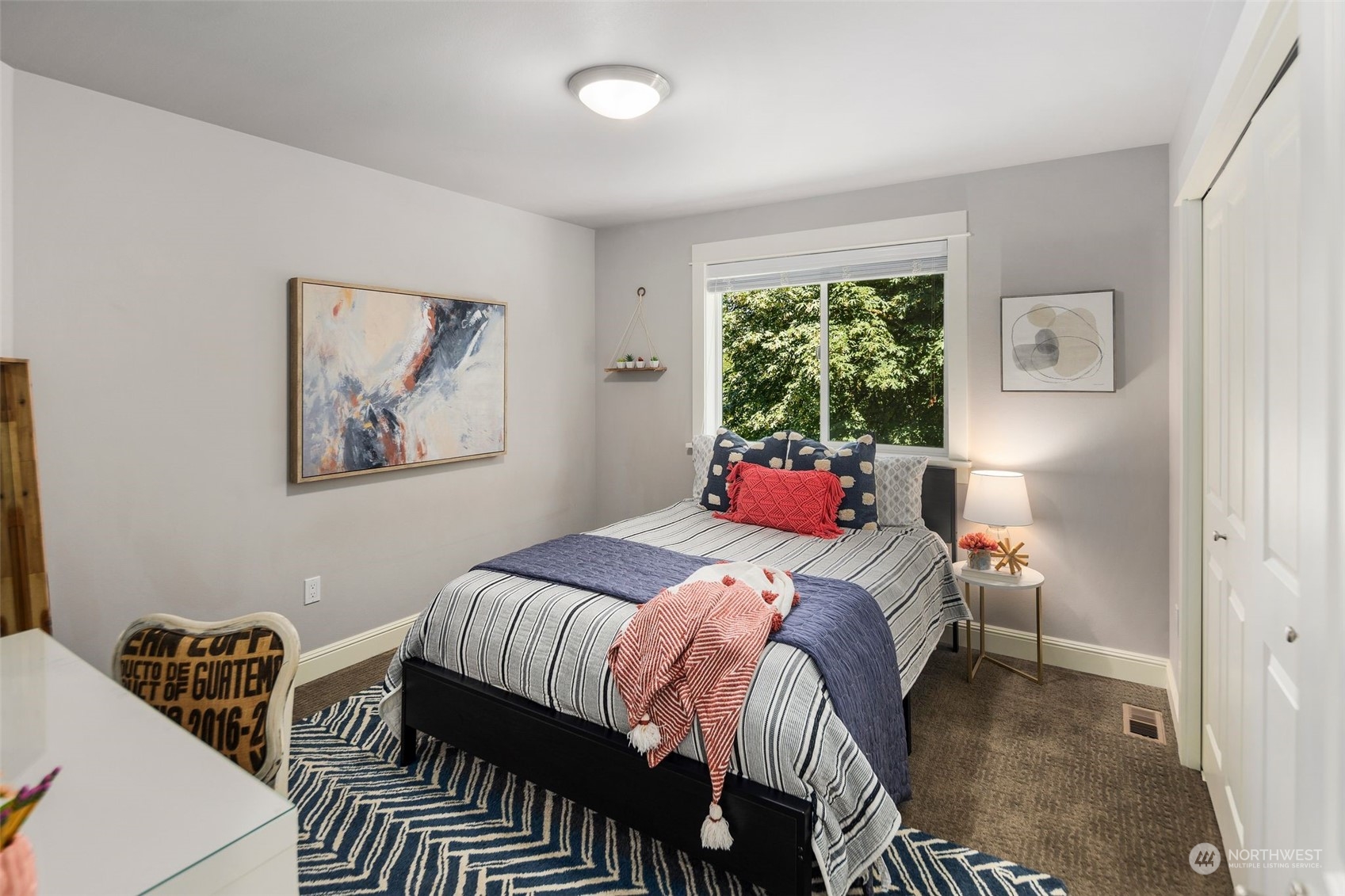 22817 Barker Road Bothell, WA 98021 - Photo 28 of 40 a bedroom with a bed and a window