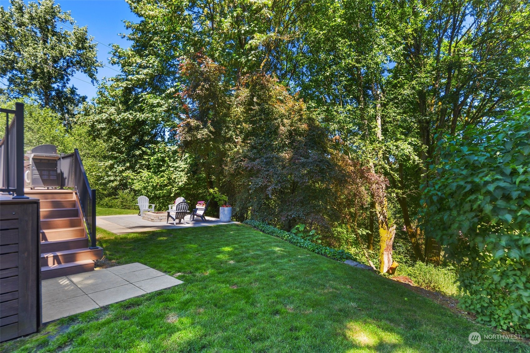 22817 Barker Road Bothell, WA 98021 - Photo 34 of 40 a view of a backyard with a garden