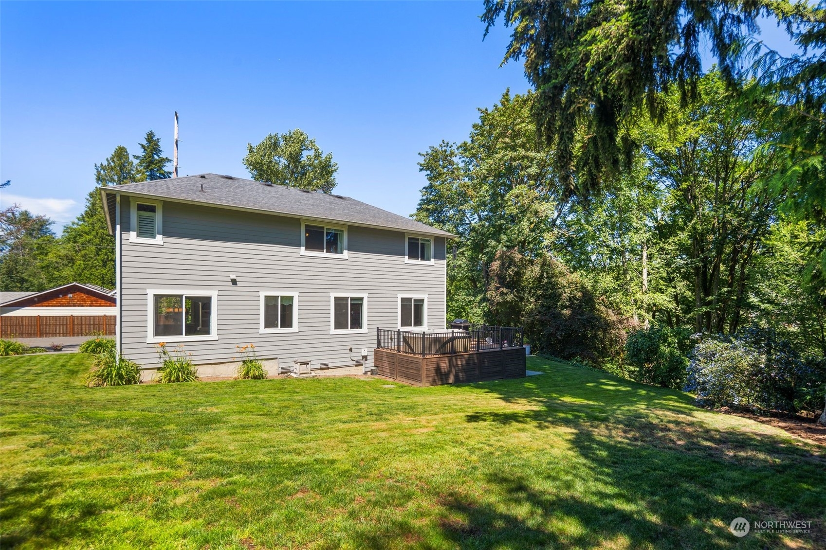 22817 Barker Road Bothell, WA 98021 - Photo 38 of 40 a front view of house with yard and green space