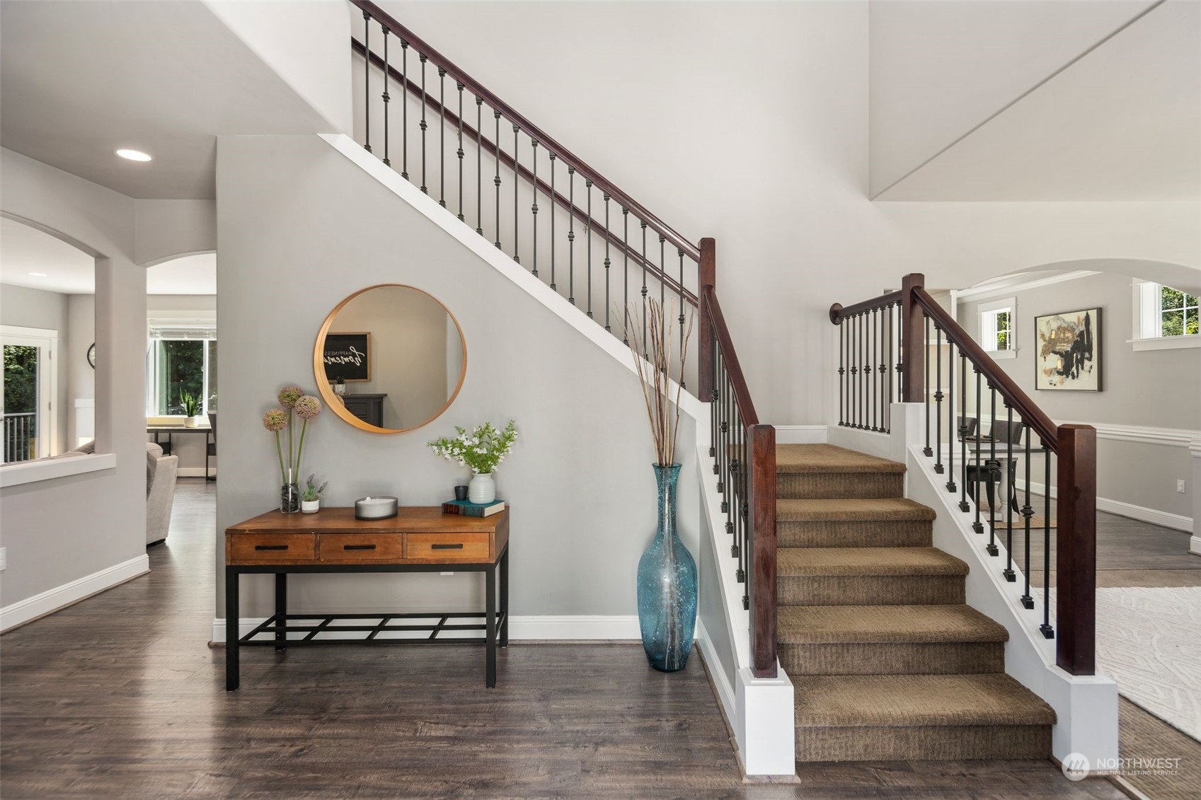 22817 Barker Road Bothell, WA 98021 - Photo 5 of 40 a view of a livingroom with wooden floor and furniture