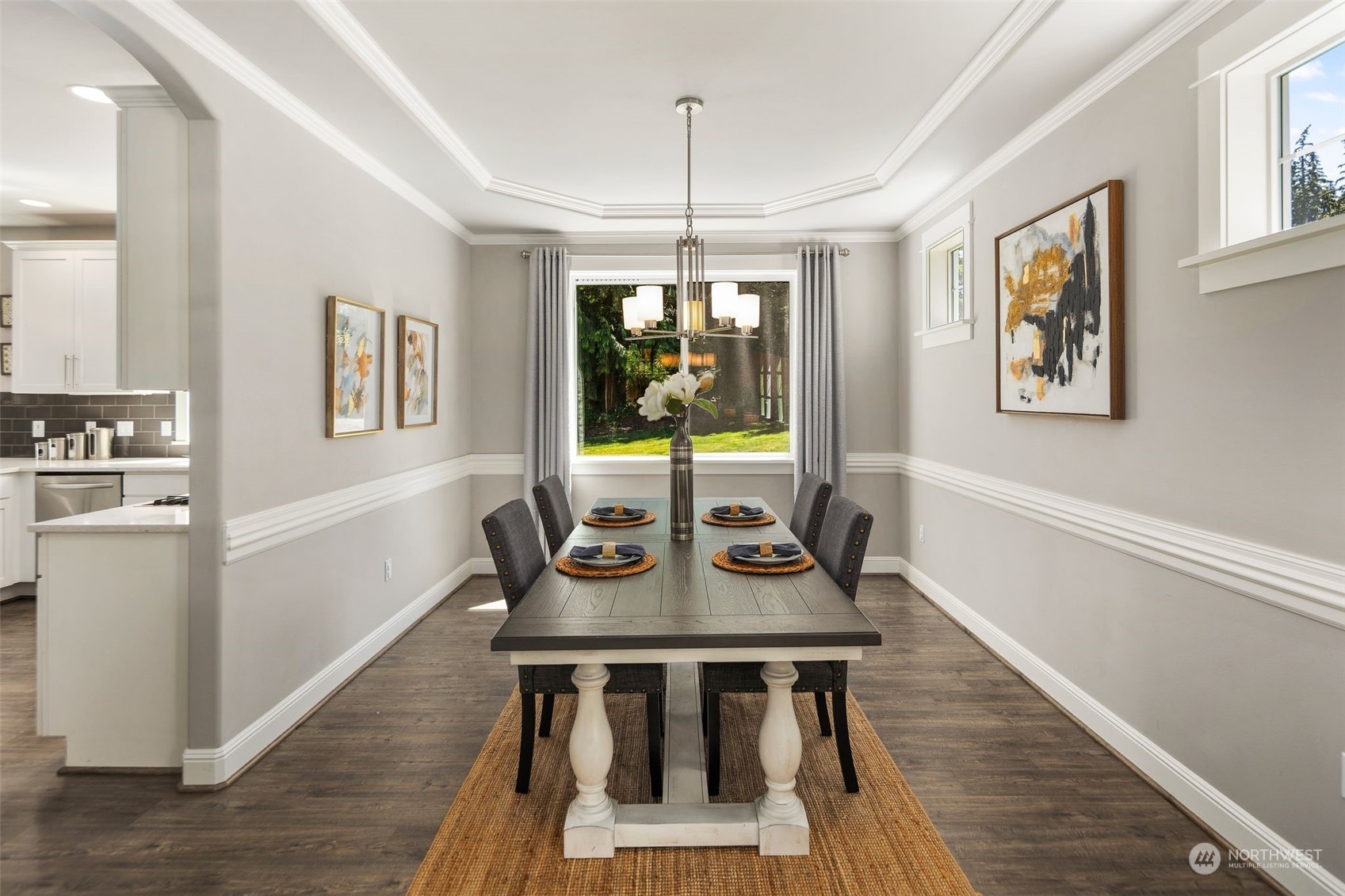 22817 Barker Road Bothell, WA 98021 - Photo 8 of 40 a view of a dining room with furniture window and wooden floor