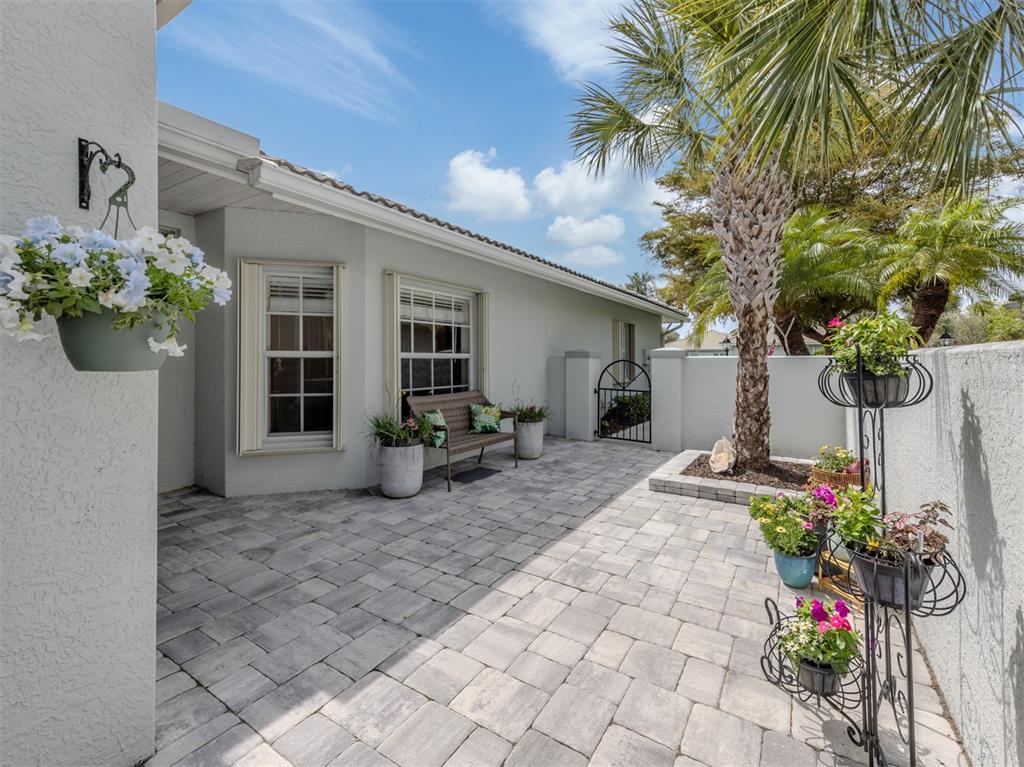 205 Reclinata Circle Venice, FL 34292 - Photo 7 of 62 a view of a house with a backyard and a garden