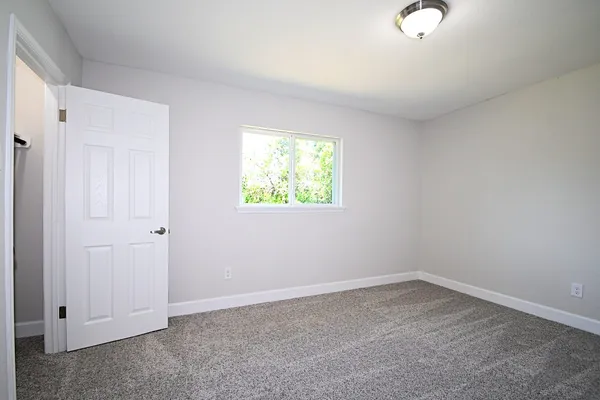 an empty room with windows