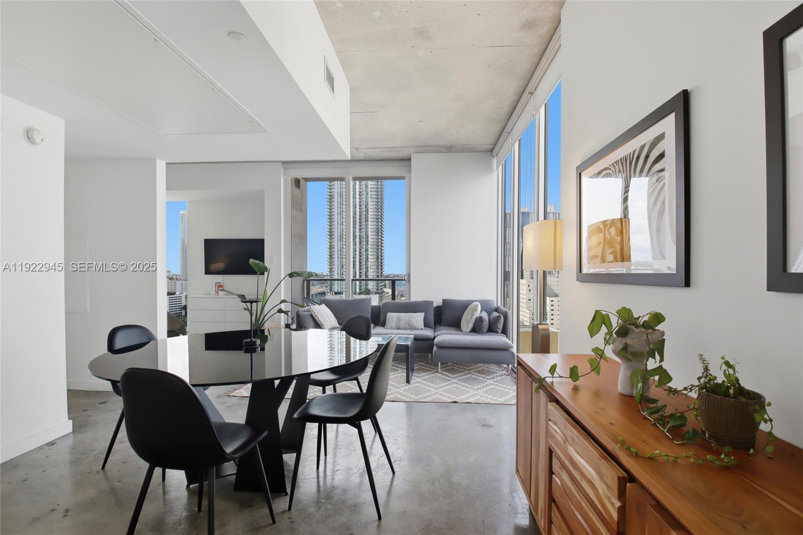 a view of a dining room with furniture
