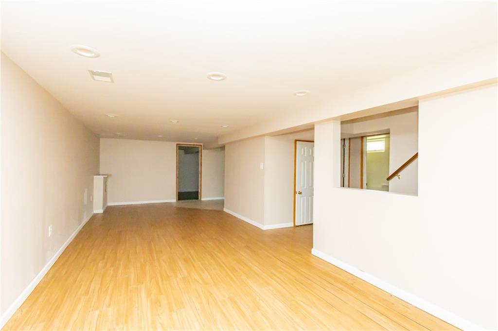 634 Bairdford Road Gibsonia, PA 15044 - Photo 6 of 23 a view of empty room with wooden floor