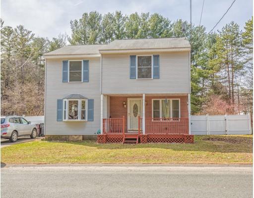 228 Old County Road Westfield, MA 01085 - Photo 1 of 23 a front view of a house having a yard