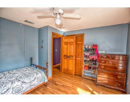 228 Old County Road Westfield, MA 01085 - Photo 17 of 23 a bedroom with a bed and a chandelier