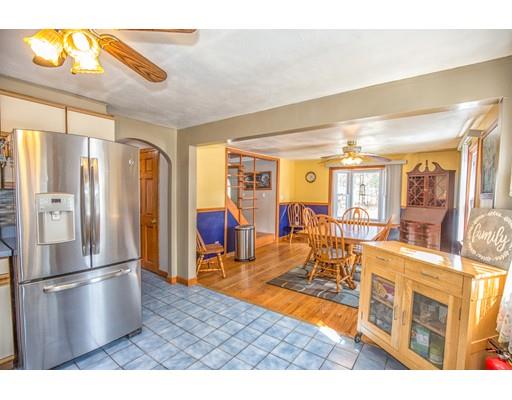 228 Old County Road Westfield, MA 01085 - Photo 5 of 23 a living room with stainless steel appliances kitchen island granite countertop furniture and a view of kitchen