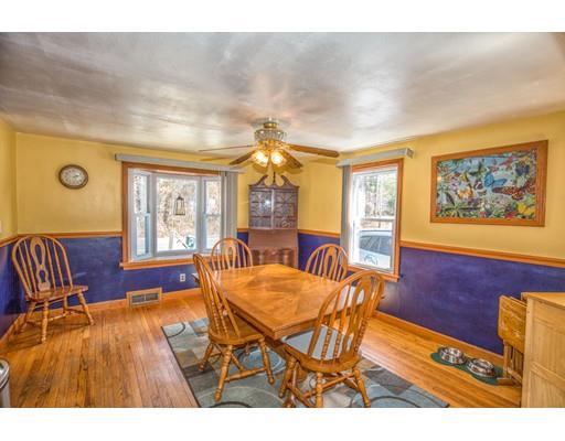 228 Old County Road Westfield, MA 01085 - Photo 6 of 23 a view of a dining room with furniture window and wooden floor