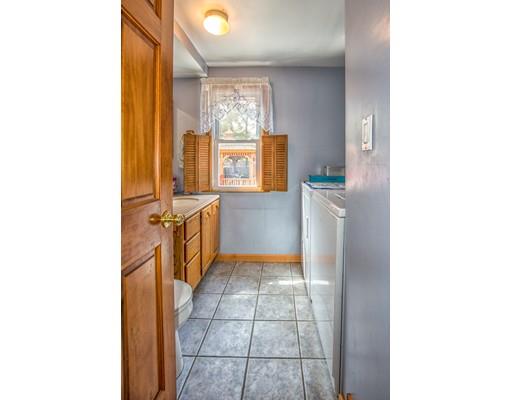 228 Old County Road Westfield, MA 01085 - Photo 8 of 23 a hallway with a sink and cabinets