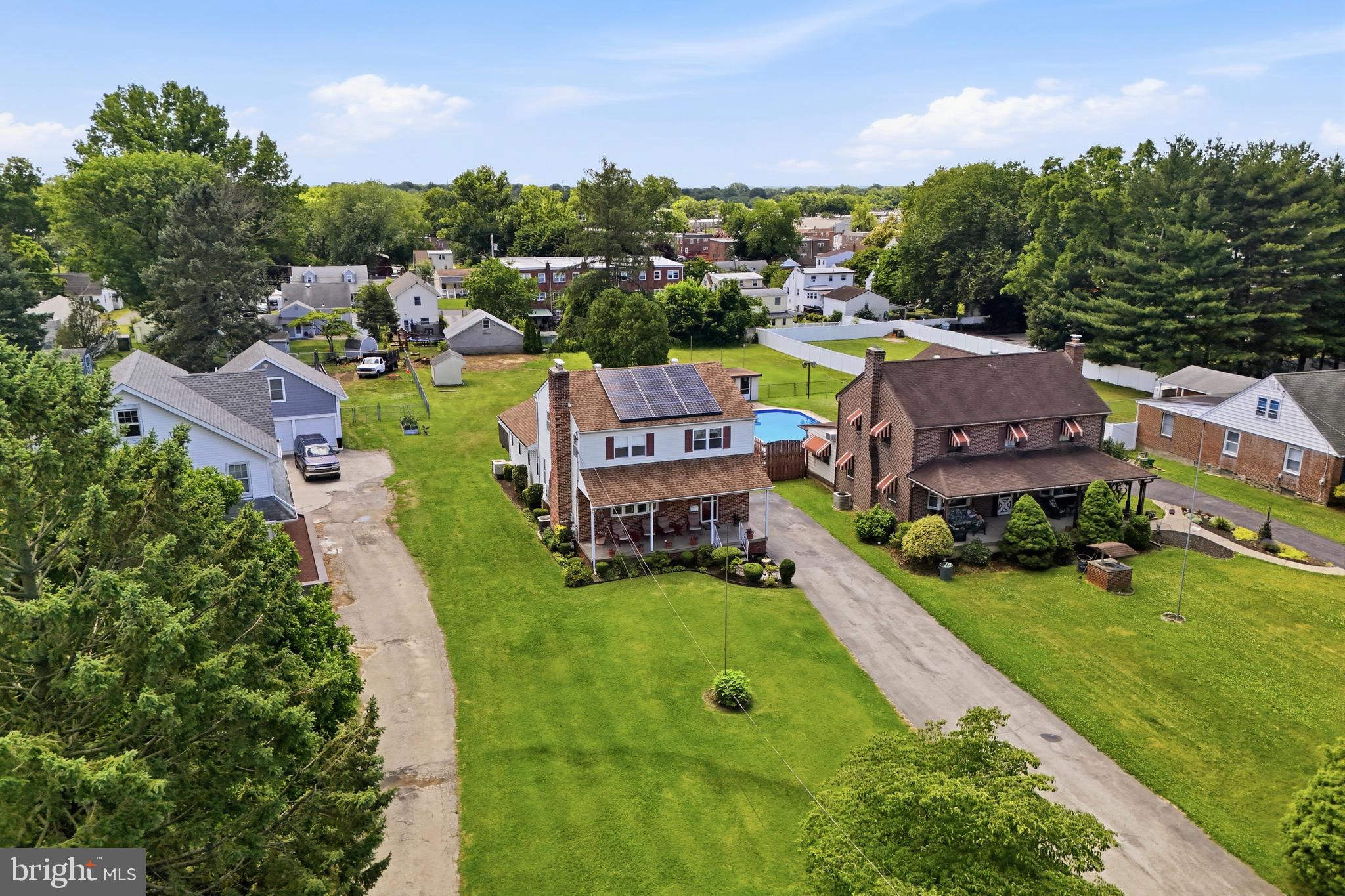 1004 Green Lane Secane, PA 19018 - Photo 37 of 49 an aerial view of a house with a garden and houses