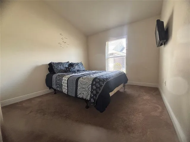 a view of a balcony with chairs