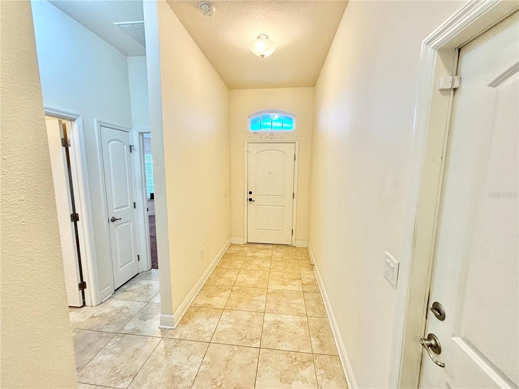 13231 Precept Way Hudson, FL 34669 - Photo 13 of 30 a view of a hallway