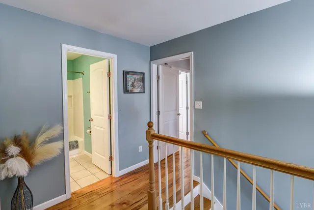 a bedroom with a bed and a table in it