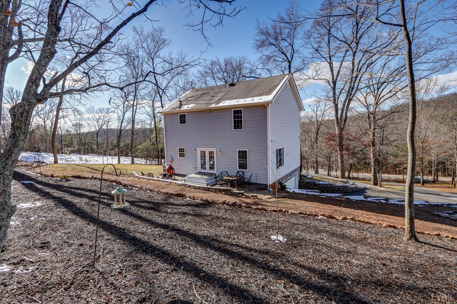 2487 Cifax Road Goode, VA 24556 - Photo 63 of 71 a view of a yard with large trees
