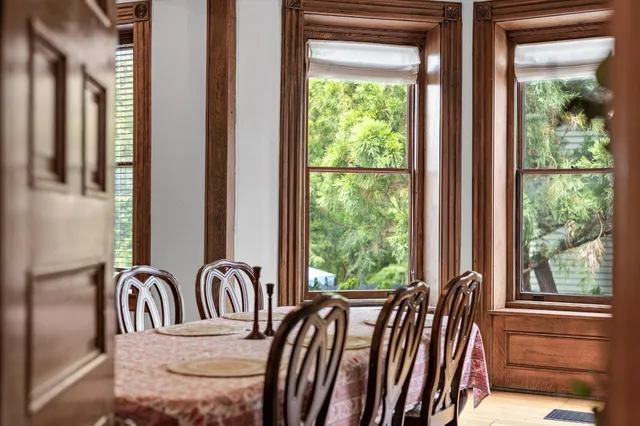 a bathroom with a shower and a sink