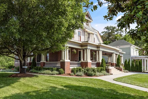 a front view of a building with grey walls