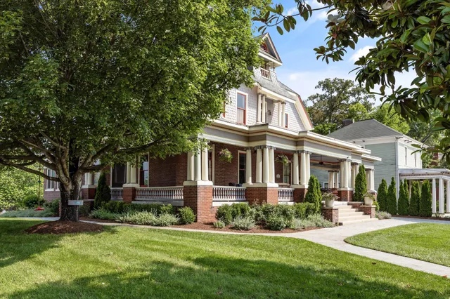 a front view of a building with grey walls