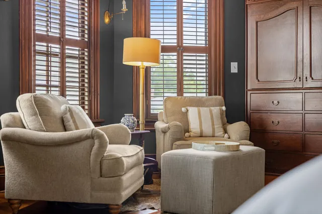 a view of a couches and a fire pit in the patio