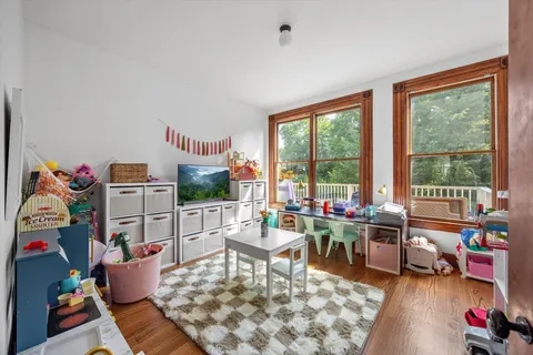 a outdoor living space with furniture and a potted plant