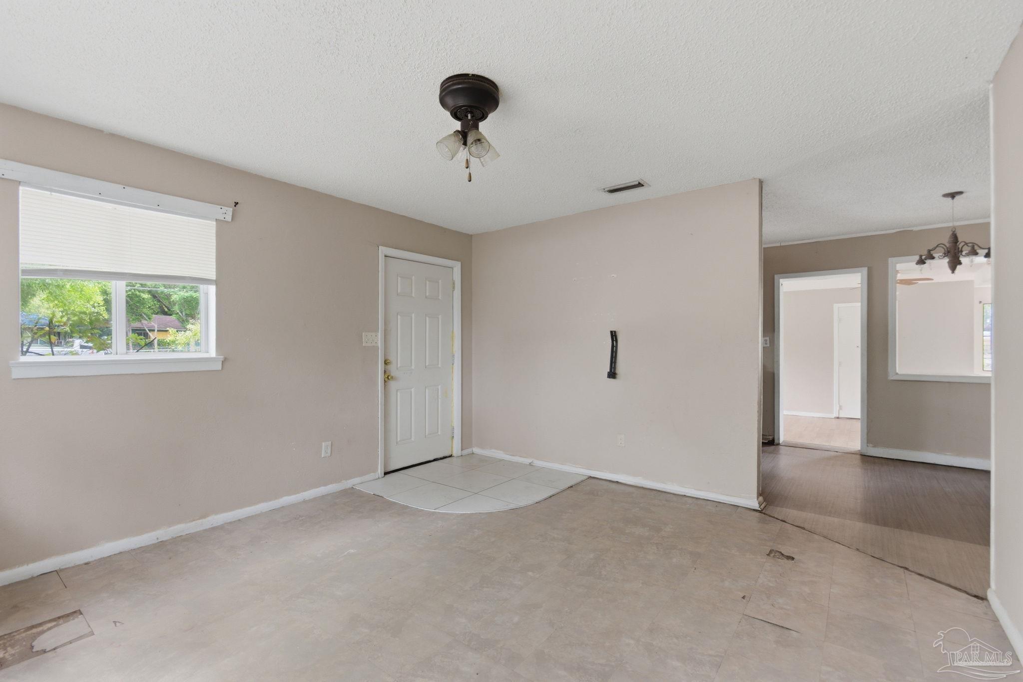 4482 Rochelle Drive Pensacola, FL 32505 - Photo 15 of 30 a view of an empty room with a window