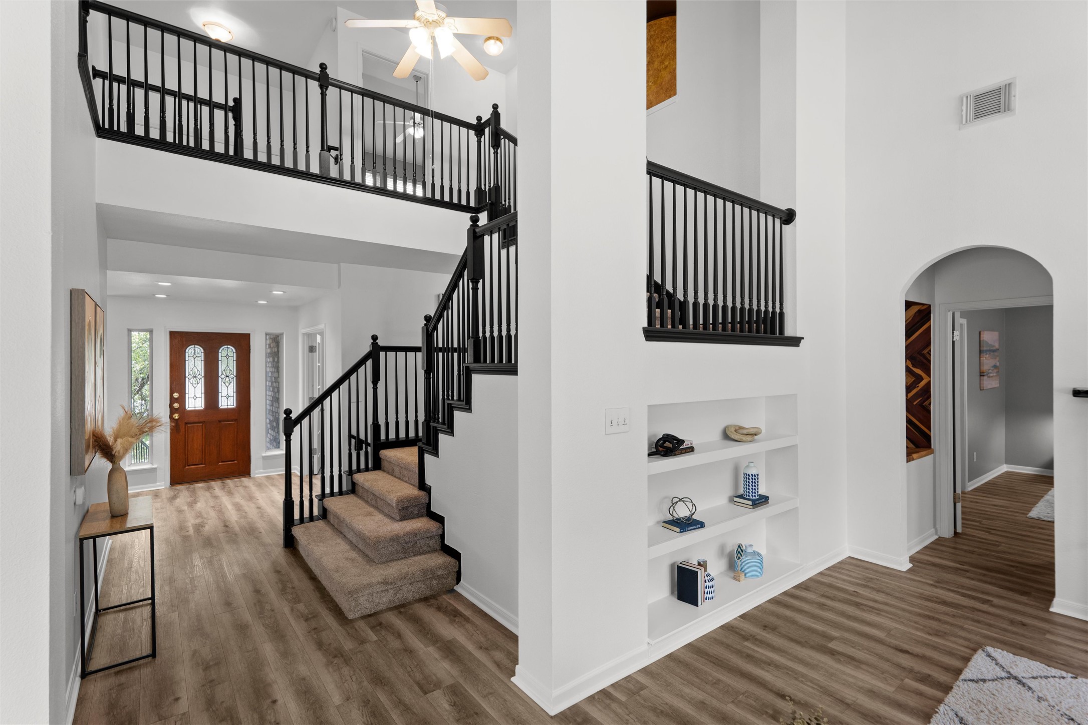 7000 Colberg Court Austin, TX 78749 - Photo 9 of 40 A grand double staircase and soaring entryway welcome you home.