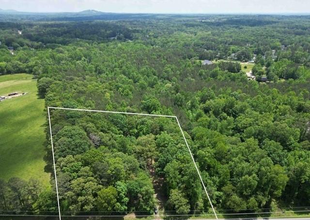 5166 Dallas Acworth Highway Dallas, GA 30132 - Photo 3 of 11 a view of a forest from a yard